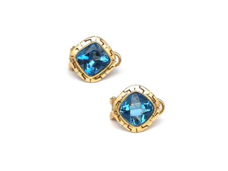 Aretes calados con topacios azules en oro amarillo 14 kilates. Supply