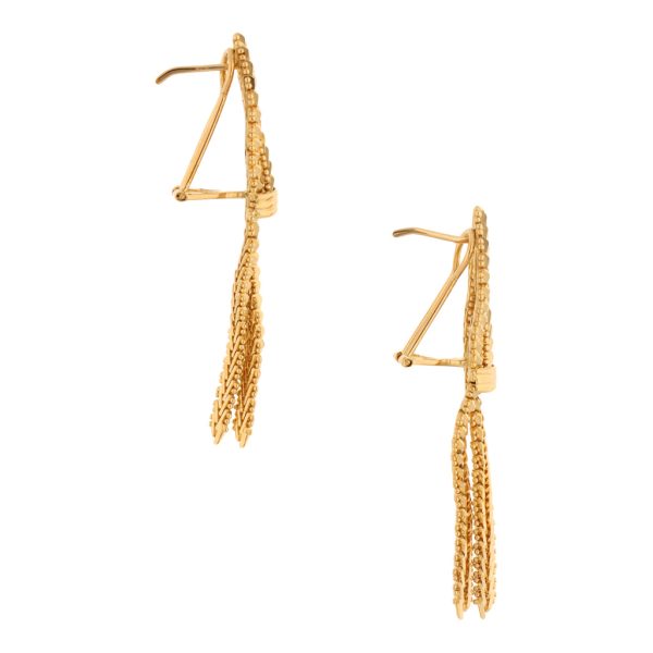 Aretes boleados con colgantes en oro amarillo 18 kilates. Fashion