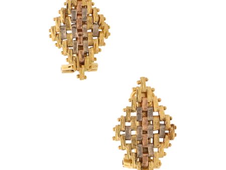 Aretes boleados en oro tres tonos 18 kilates. Fashion