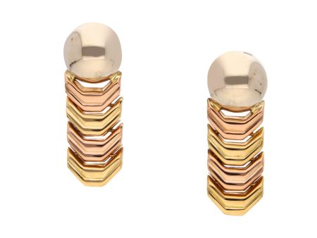 Aretes articulados con colgantes en oro tres tonos 18 kilates. Supply