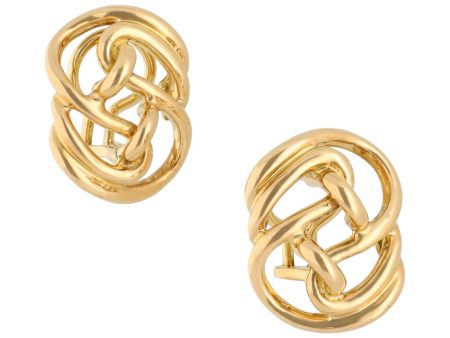 Aretes calados firma Tane en oro amarillo 18 kilates. Online