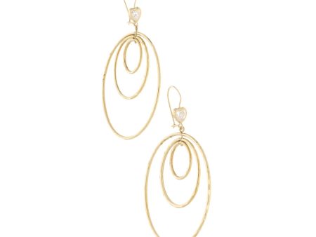 Aretes articulados motivo aros con circonias en oro amarillo 14 kilates. Sale