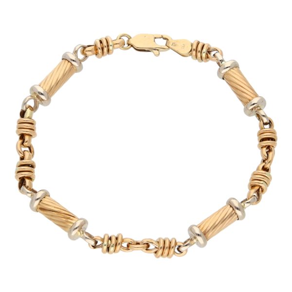 Pulsera eslabón combinado en oro dos tonos 14 kilates. Hot on Sale